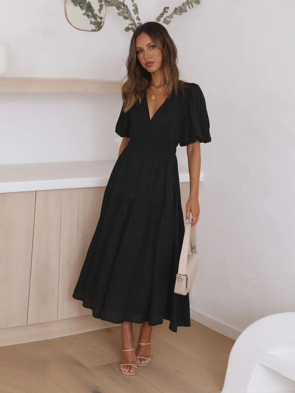 Tiered Surplice Black Midi Dress by Belle Bijouix with puff sleeves and cinched waist