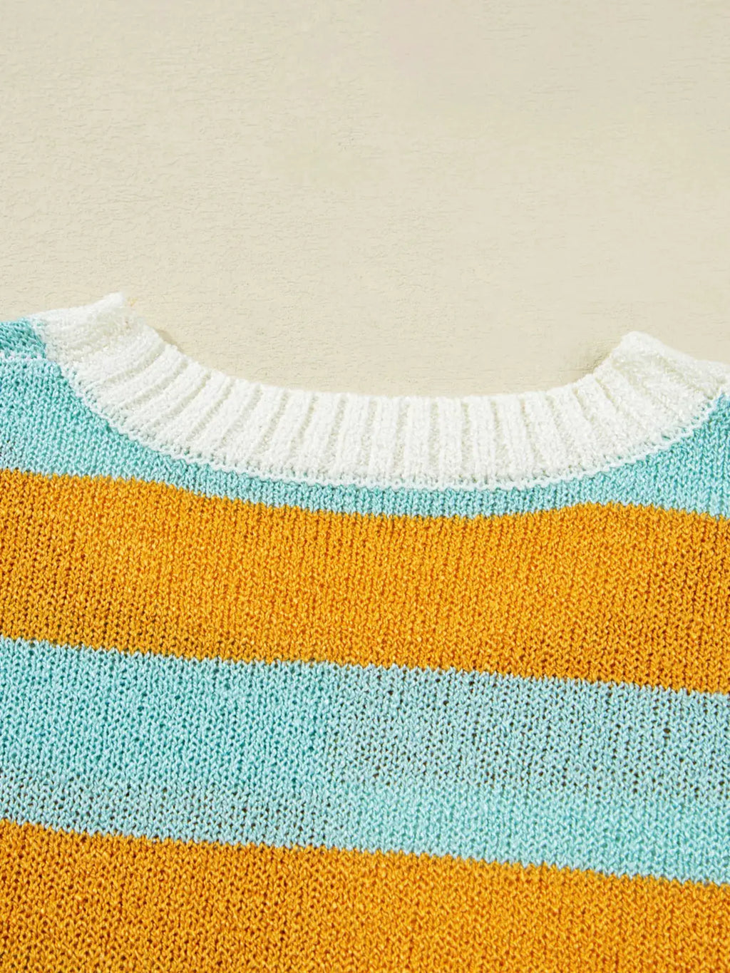 Color Block Striped Sweater with cream ribbed collar and teal, orange, and blue stripes