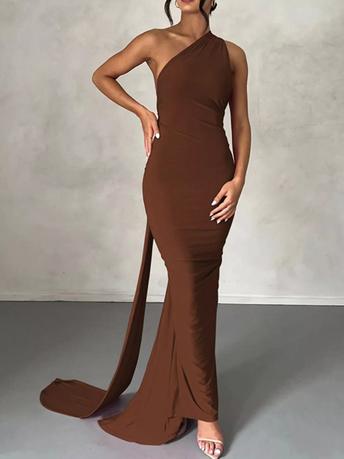 Backless One-Shoulder Ruched Bodycon Maxi Dress in brown; floor-length with a long train.