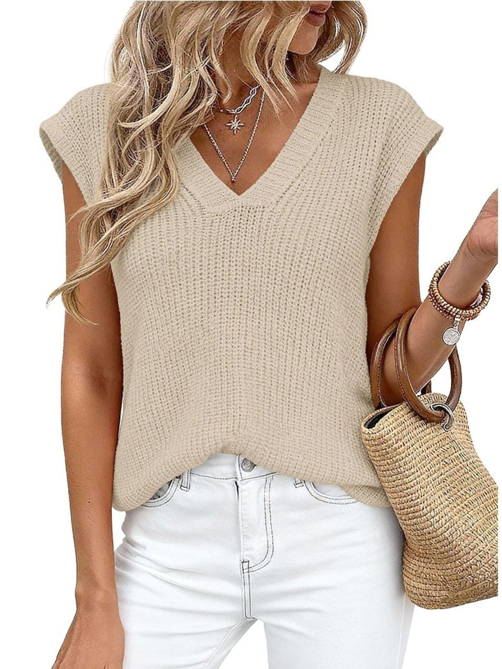V-Neck Sweater Vest by Trendsi, beige knit, sleeveless; styled with white jeans.