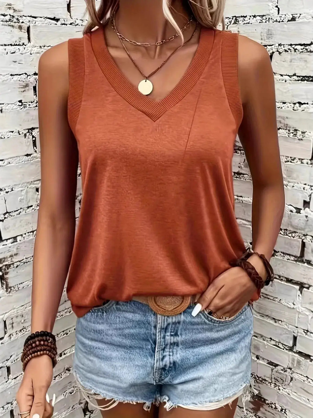 V-Neck Tank top in burnt orange; basic sleeveless top with ribbed V-neck.