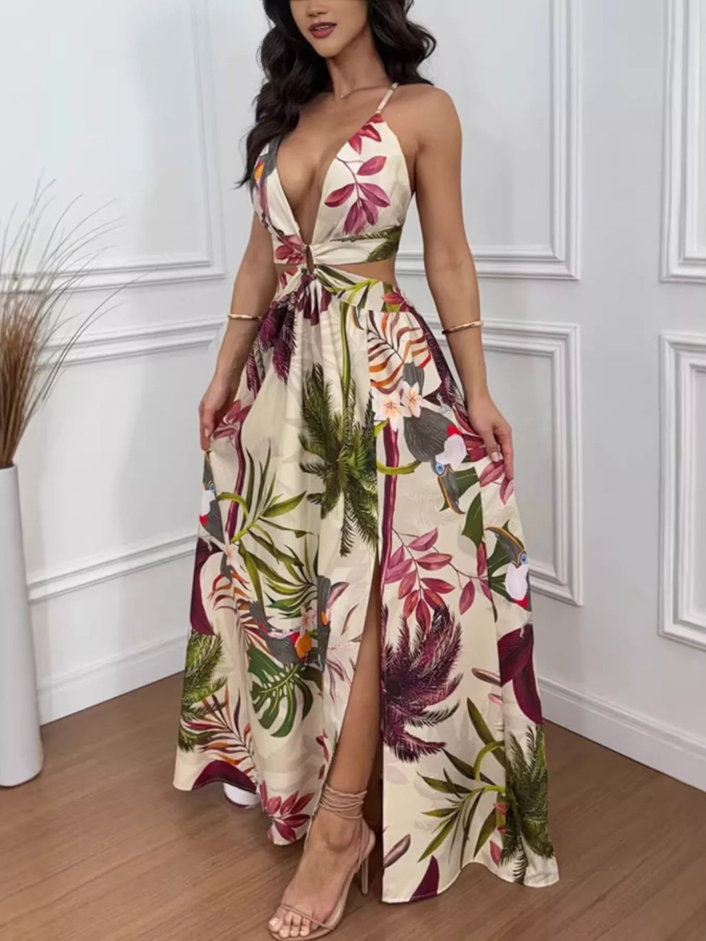 Tropical print plunge-cutout maxi dress with cream base and pink/green foliage; side slit