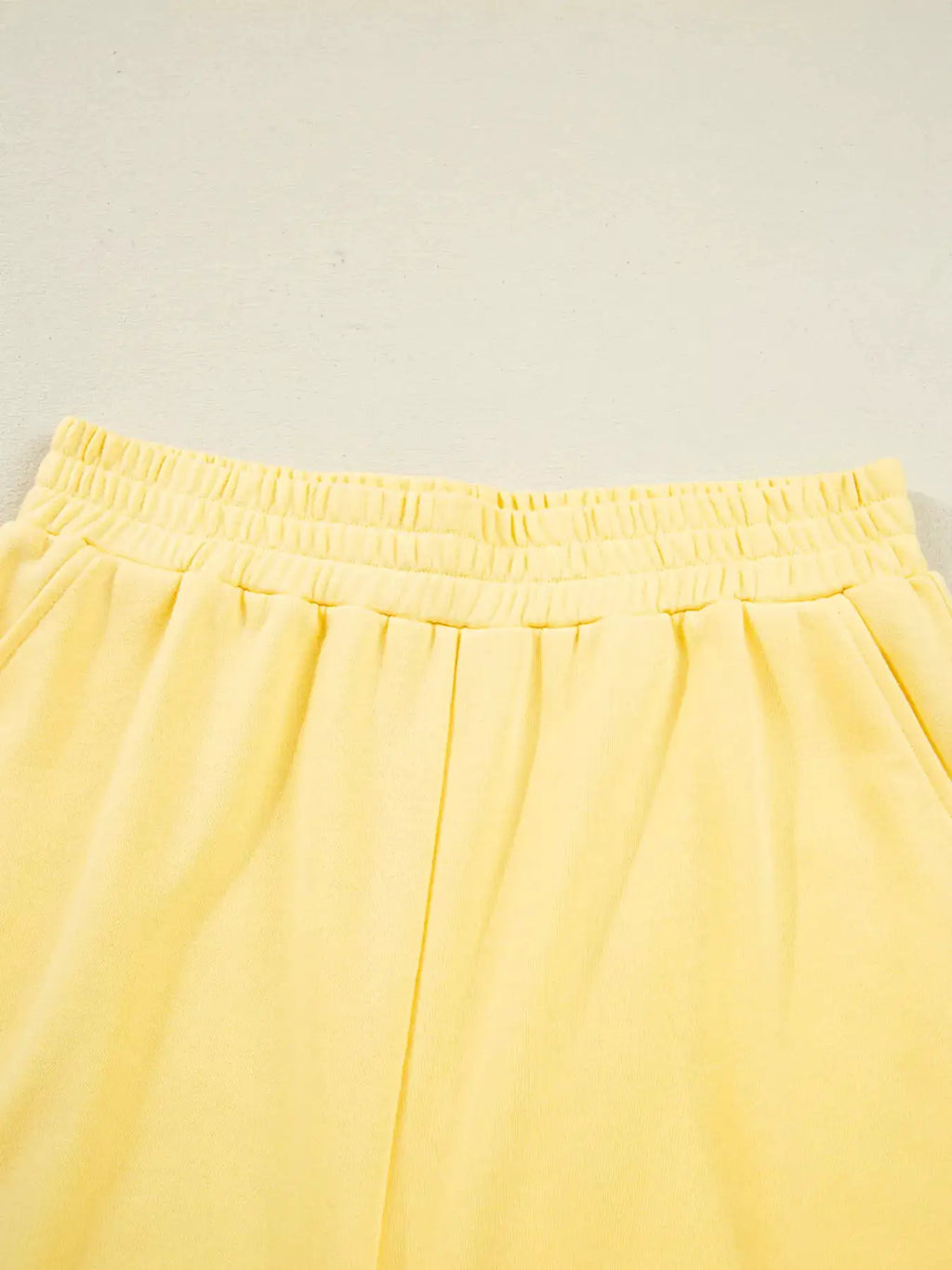 Yellow elastic-waist shorts from a 2-piece sleepwear set
