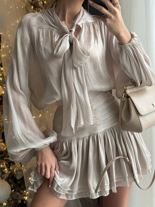 Bow-Tie Blouse and Ruched Mini Skirt Set (two-piece) by Trendsi in champagne beige, sheer fabric