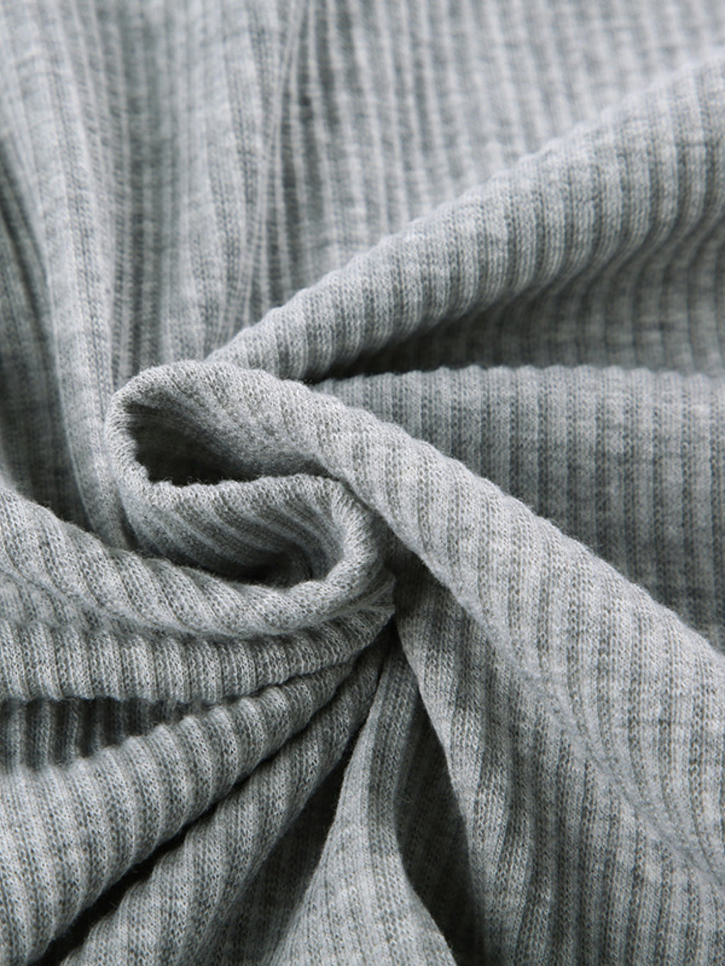 Ribbed knit hoodie set fabric in heather gray; close-up texture of loungewear knit