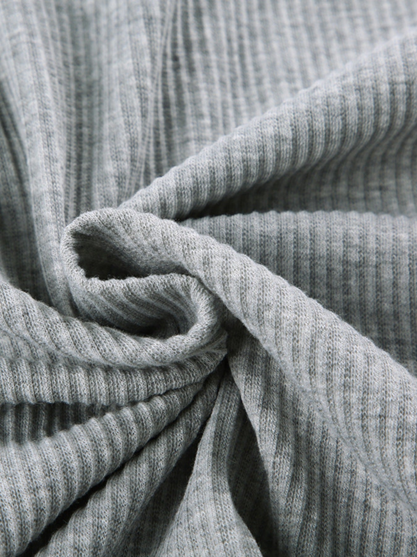 Ribbed knit hoodie set fabric in heather gray; close-up texture of loungewear knit