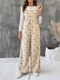 Bow Wide Leg Corduroy Overalls in beige with black bow print, adjustable straps, wide legs
