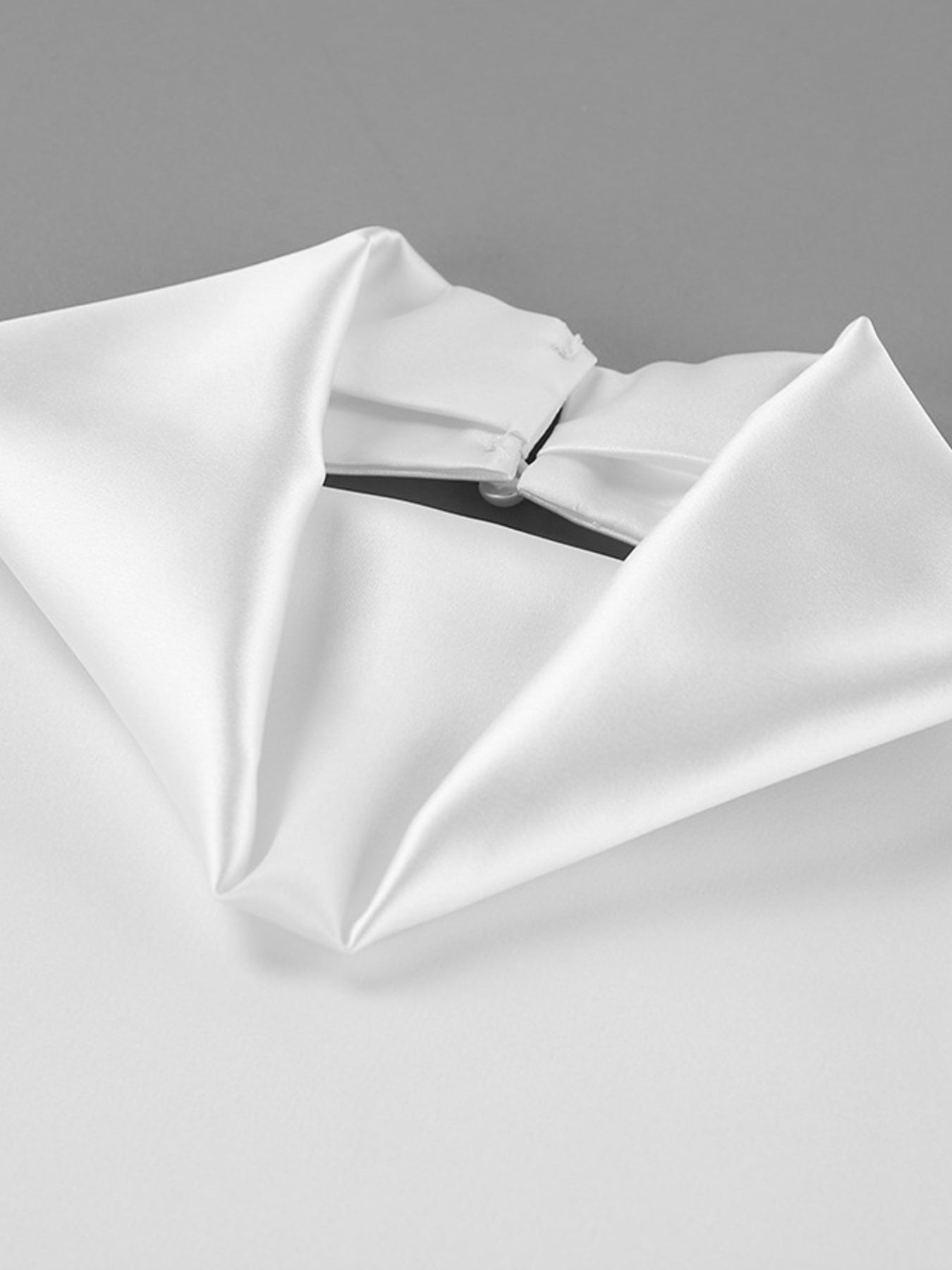 Halter Neck Satin Cami in white; smooth satin fabric.
