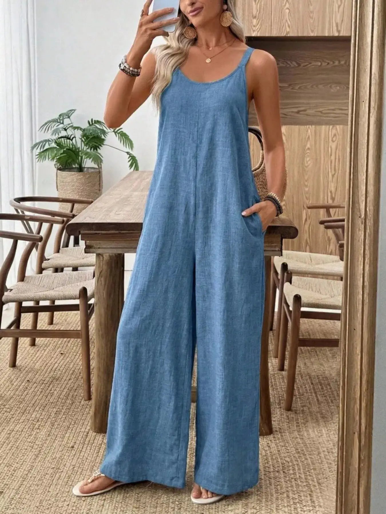 Spaghetti-strap wide-leg jumpsuit in light blue denim with pockets