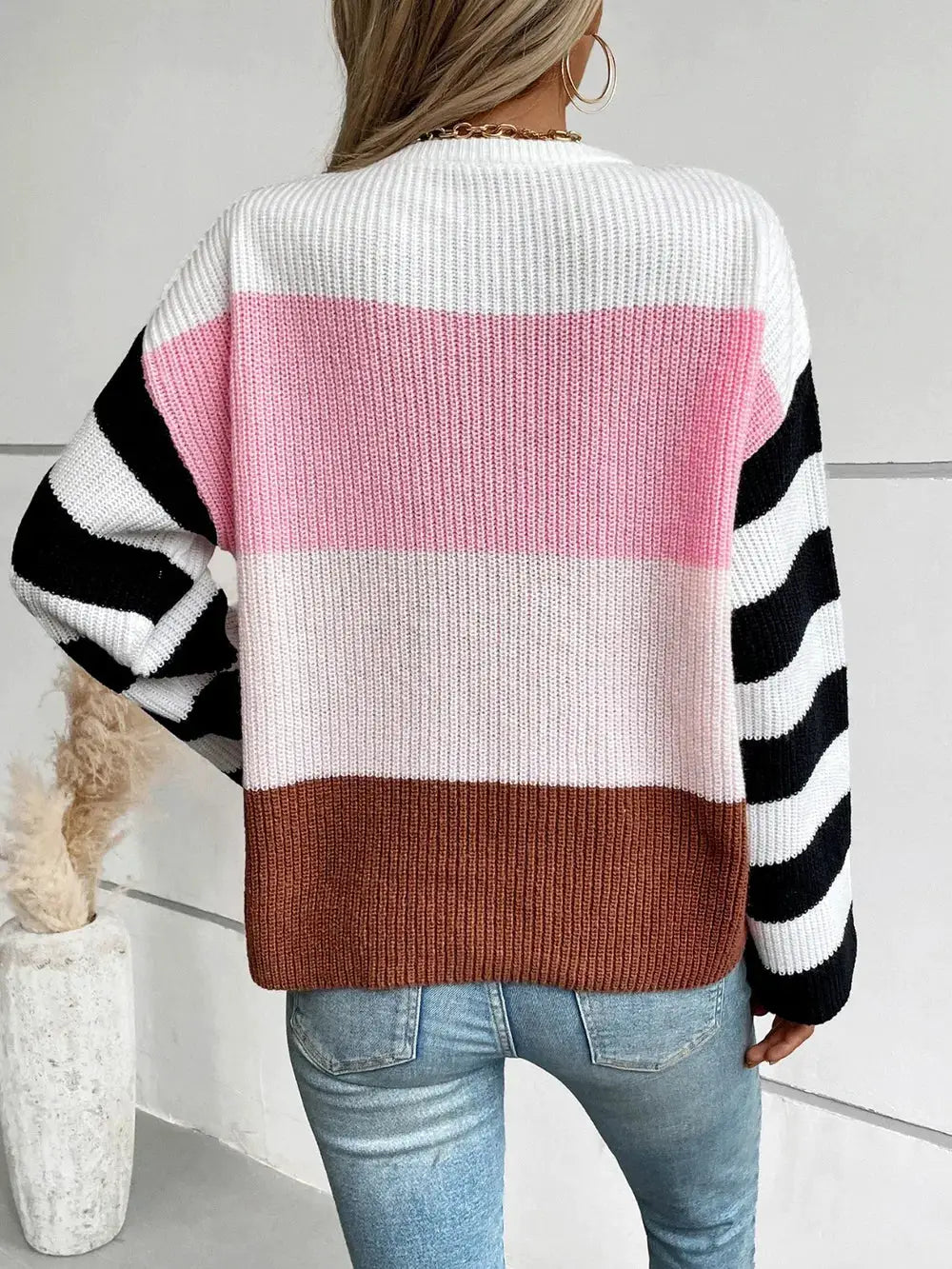 Color Block Round Neck Long Sleeve Sweater with white, pink and brown blocks and striped black-and-white sleeves.