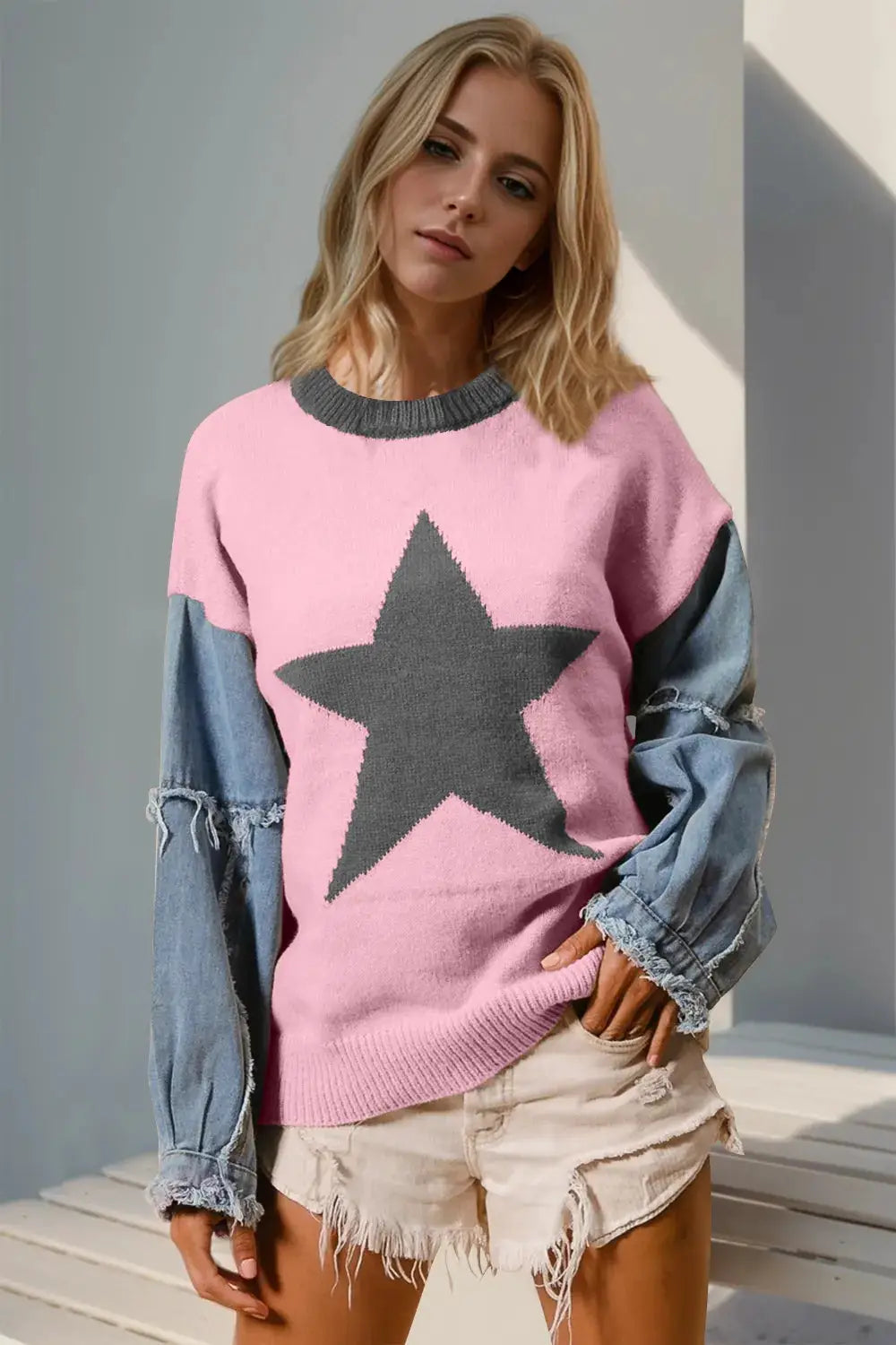 Double Take full-size star-pattern sweater with pink body, gray star, and distressed denim sleeves