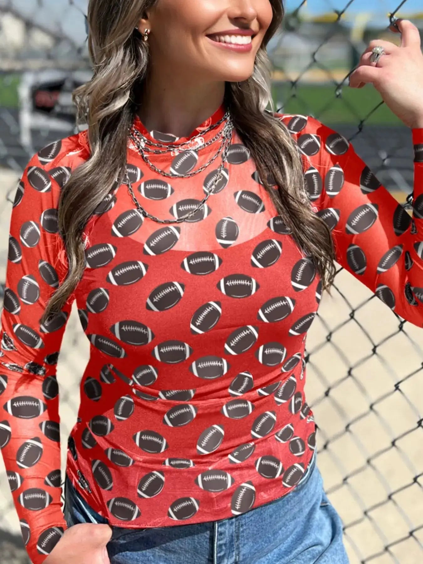 Game Day Mesh Sheer Long Sleeve Top in red with football print