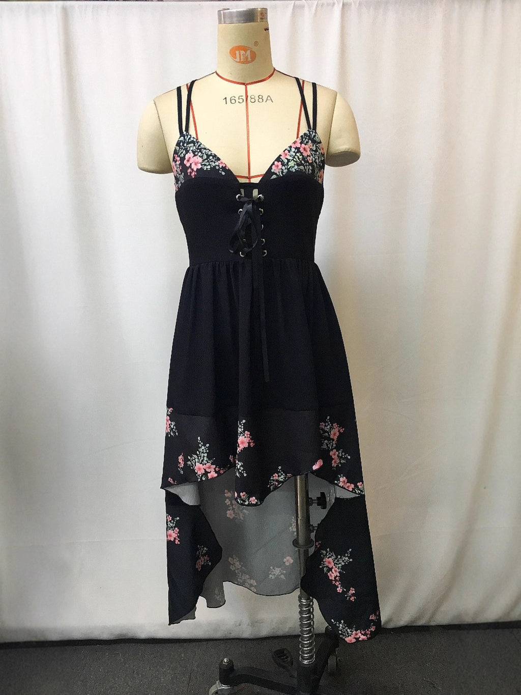 Floral print high-low cami dress by Trendsi; black base with pink blossoms, lace-up bodice