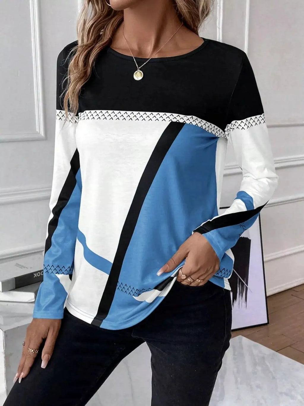 Color Block Long Sleeve T-Shirt by Belle Bijouix in black, white, and blue with a geometric stripe design.