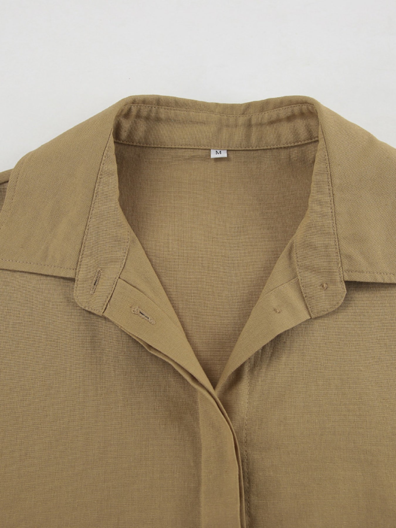 Long Sleeve Top and Shorts Set in tan; close-up of a collared shirt neckline.