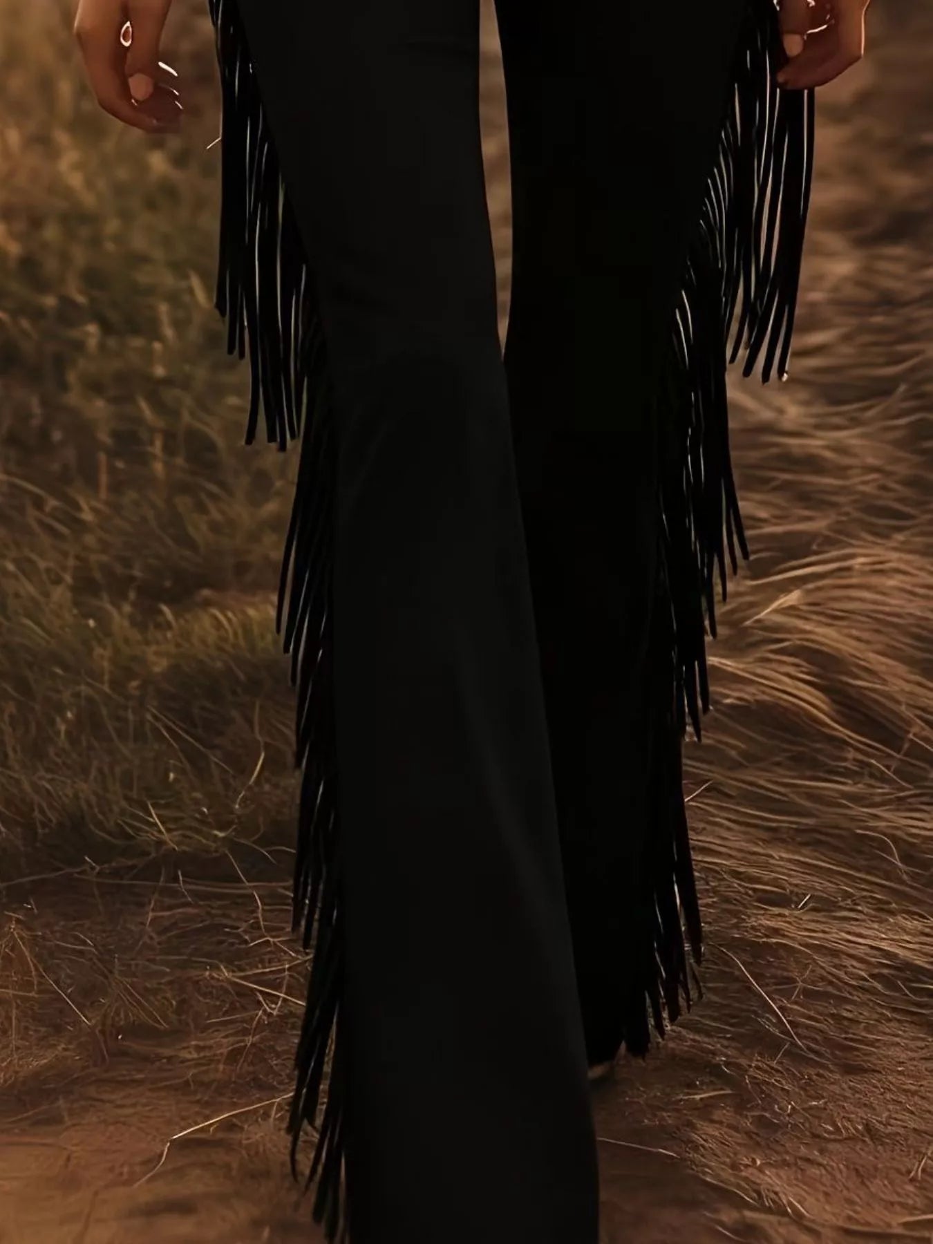 Fringe Trim Flare Pants in black with long fringe along the sides