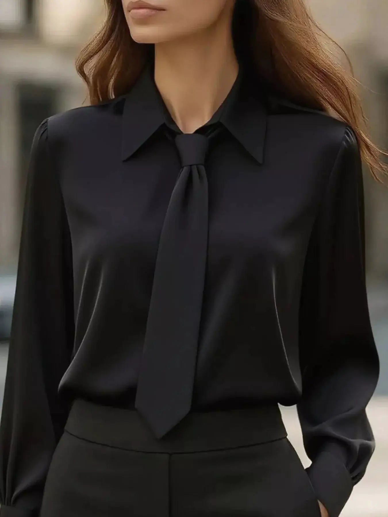 Collared Neck Long Sleeve Blouse in black satin with a tie at the neck.