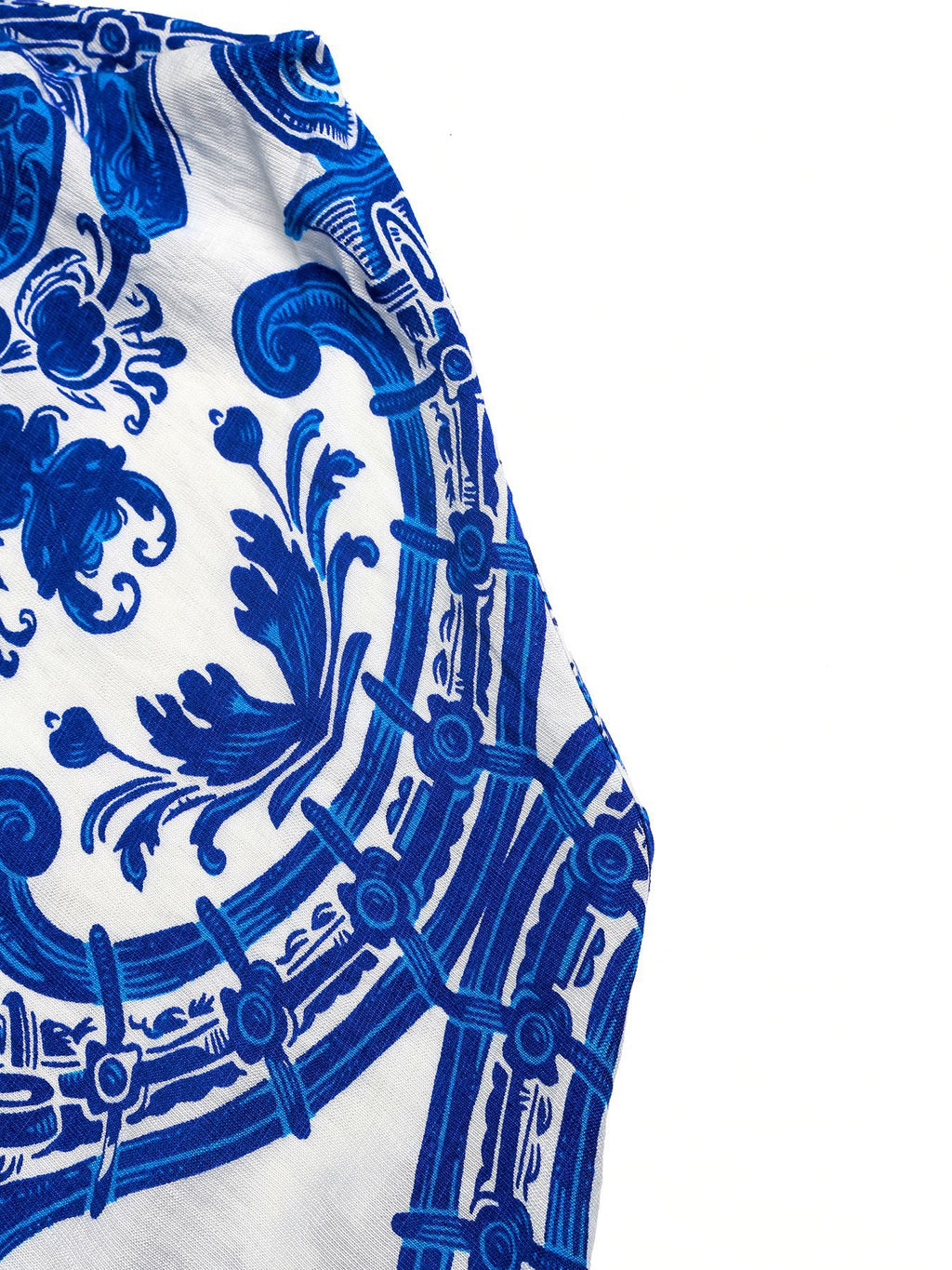 Printed Halter Neck Maxi Dress in blue and white ornate pattern with crisscross, tied straps