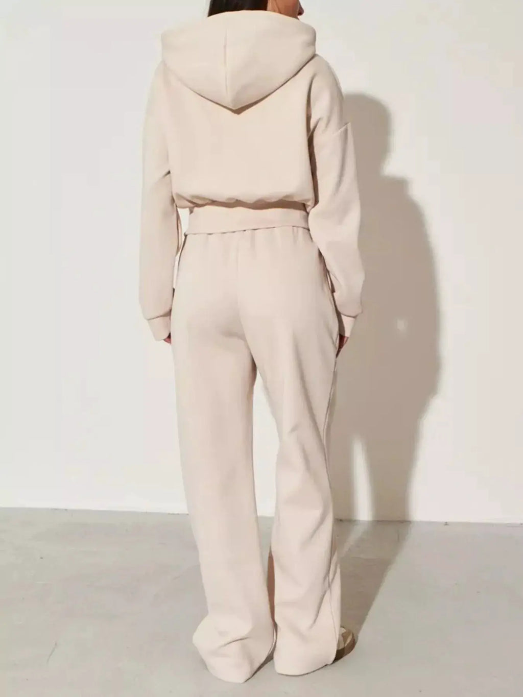 Zip-Up Hoodie & Wide-Leg Pants Set by Belle Bijouix in beige loungewear, back view.