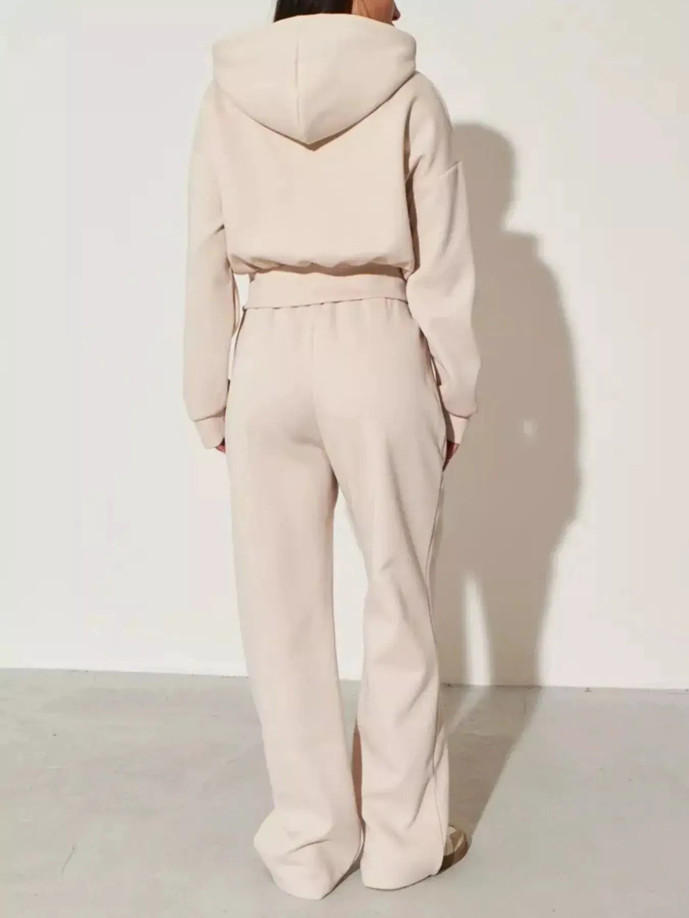 Zip-Up Hoodie & Wide-Leg Pants Set by Belle Bijouix in beige loungewear, back view.