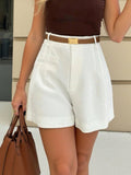 High-Waisted Shorts in white with brown woven belt and pockets.