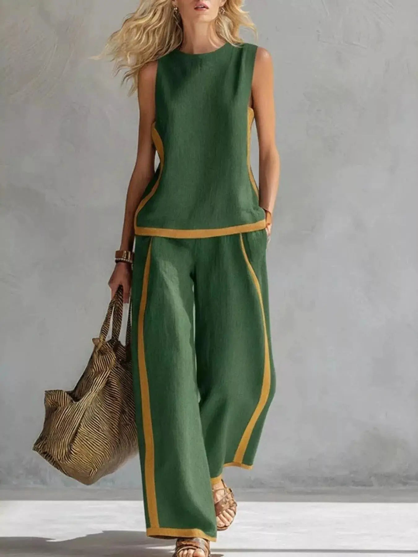 Outfit set: 2-piece, plus-size green sleeveless top and wide-leg pants with mustard piping by Belle Bijouix.