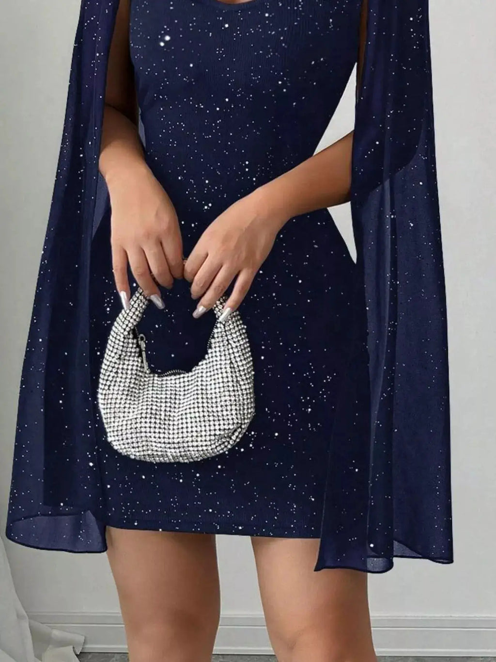 Cutout Bodycon Mini Dress with Cape Sleeves in navy glitter by Belle Bijouix