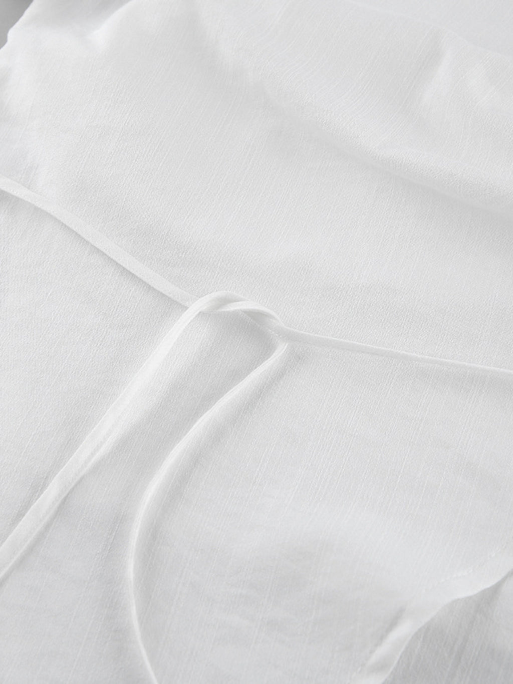Wrap Top & Wide Leg Pants Set by Belle Bijouix in white with tie waist detail and soft fabric texture