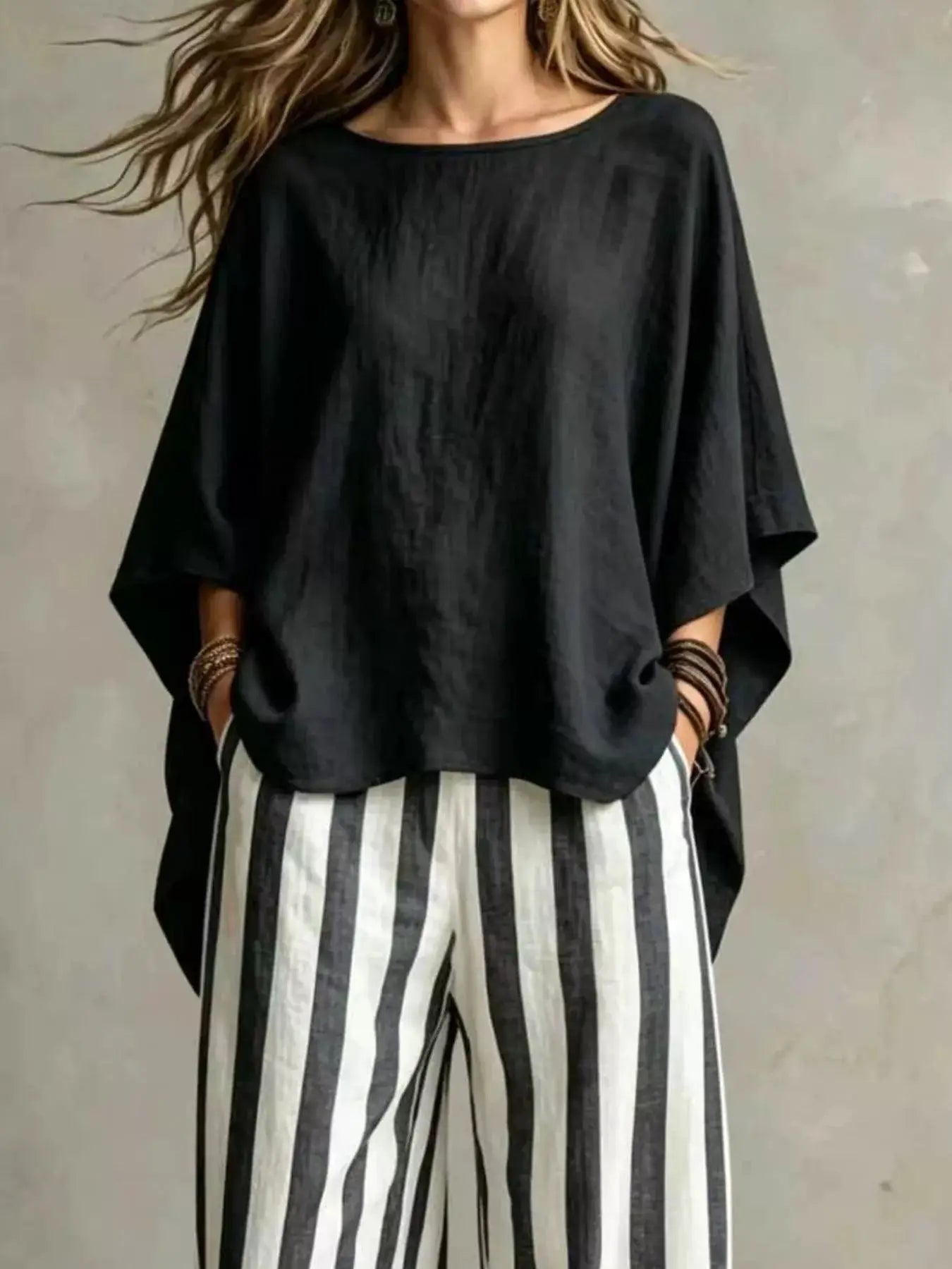 Plus-Size Outfit Set by Belle Bijouix: black oversized top with wide sleeves and black/white striped pants