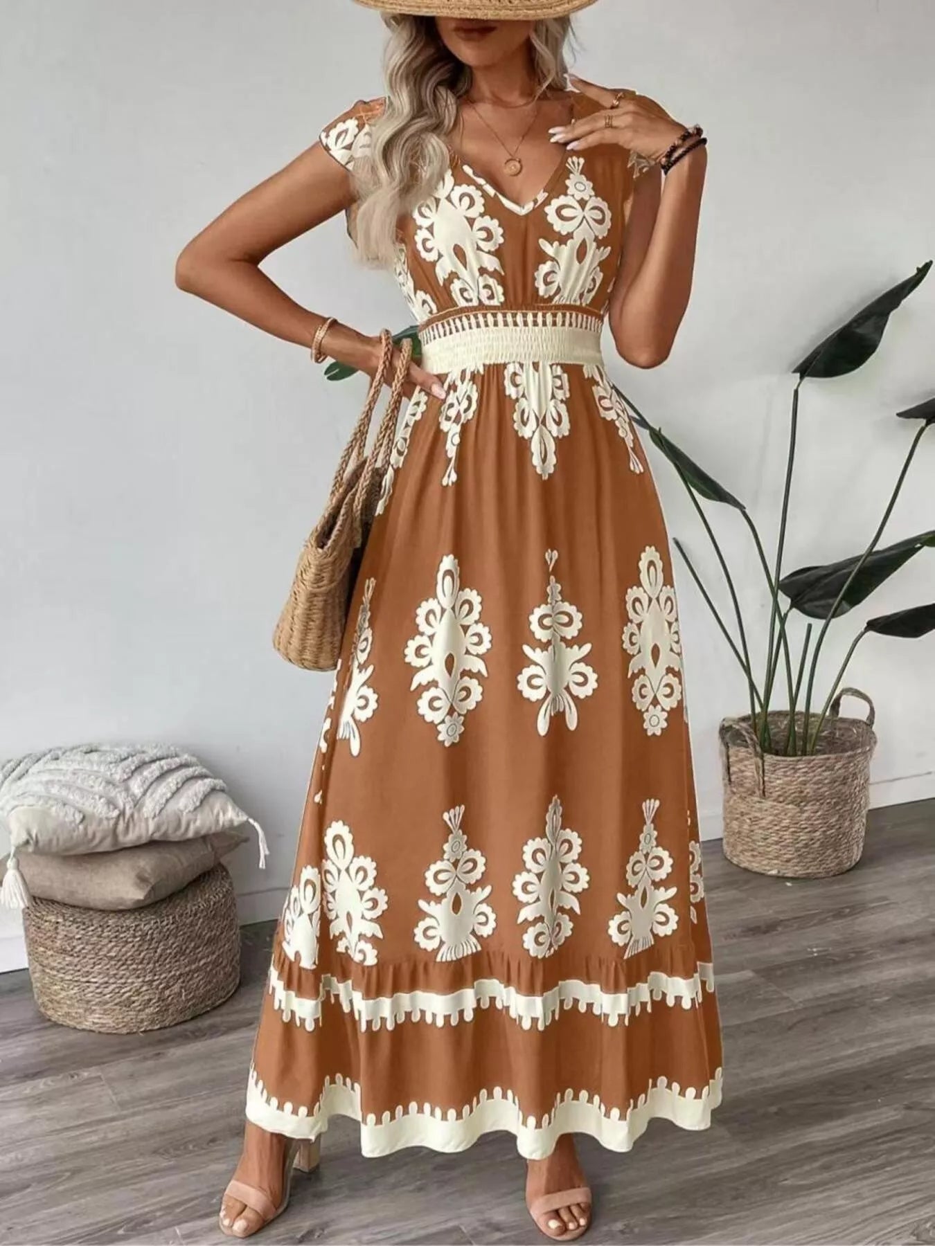 Belle Bijouix printed v-neck ruffled cap-sleeve dress in brown with white ornate pattern and smocked waist