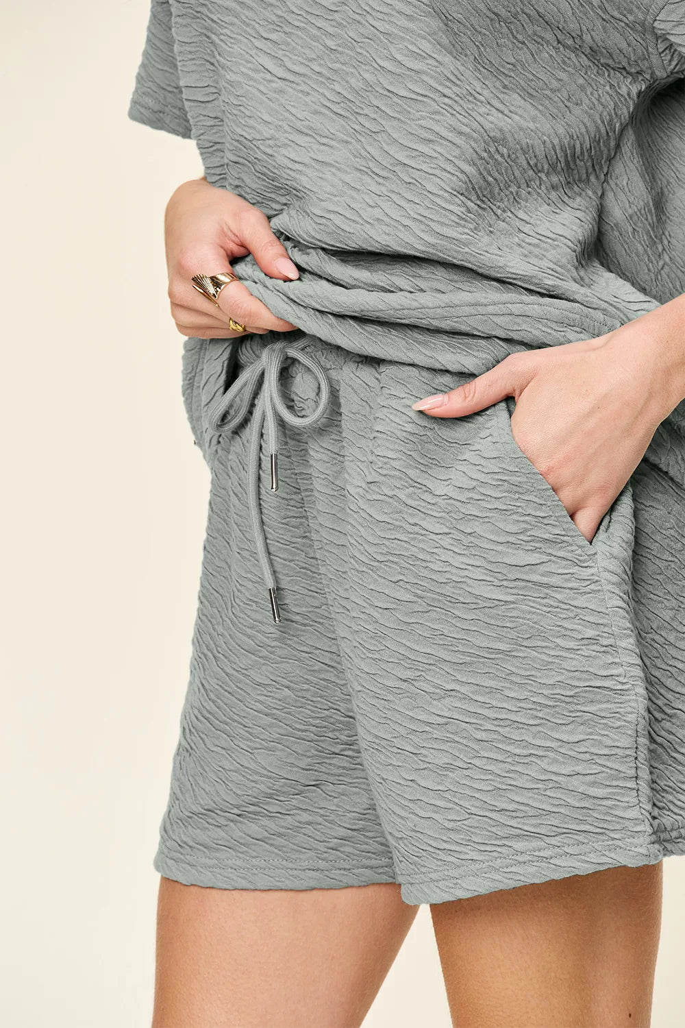 Double Take Full Size Texture Short Sleeve T-Shirt and Drawstring Shorts Set in grey textured fabric with pockets