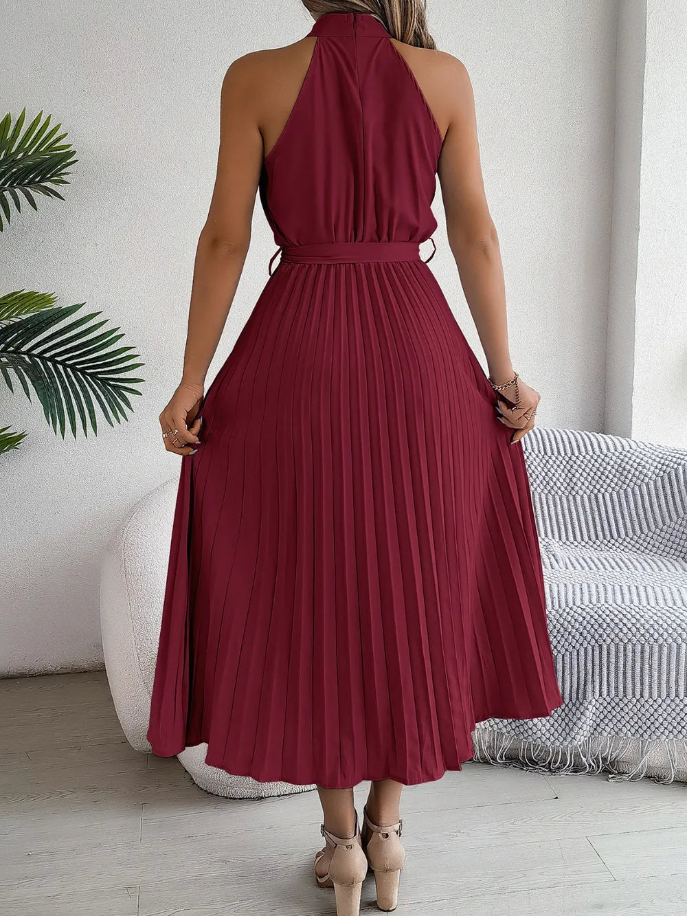 Pleated tie-waist sleeveless midi dress in burgundy by Belle Bijouix