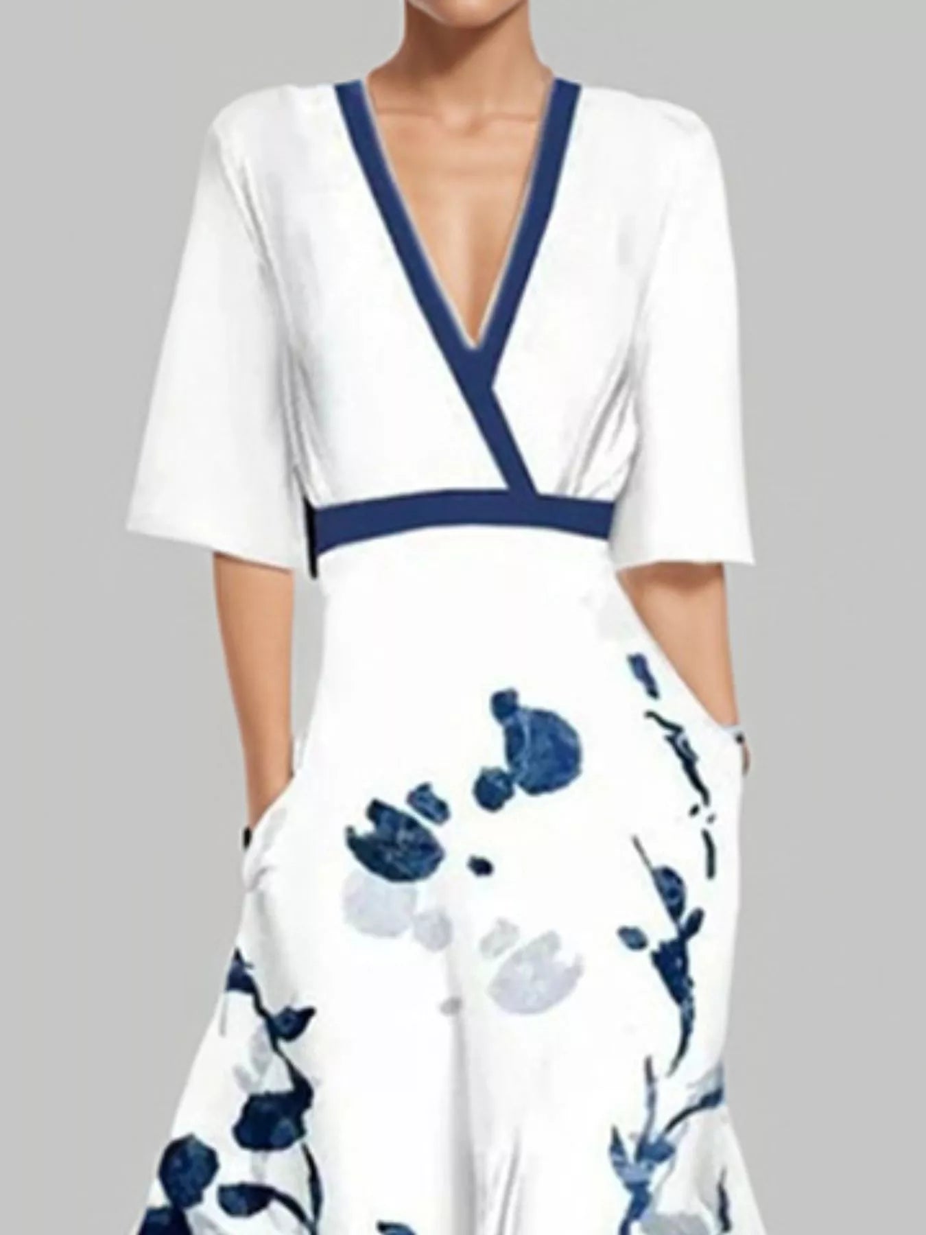 Floral print half-sleeve white maxi dress by Trendsi with navy trim and pockets