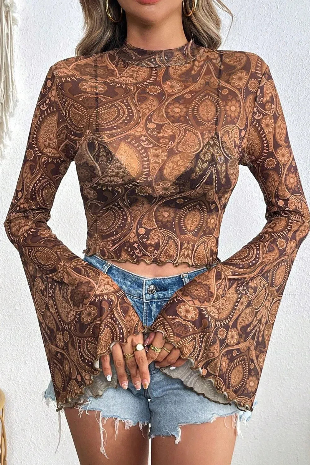 Printed Mock Neck Flare Sleeve Top in brown paisley sheer fabric with cropped long sleeves