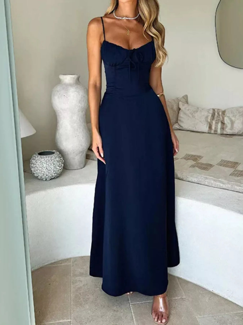 Tie Front Spaghetti Strap Maxi Dress in navy with a front tie and flowing maxi skirt.