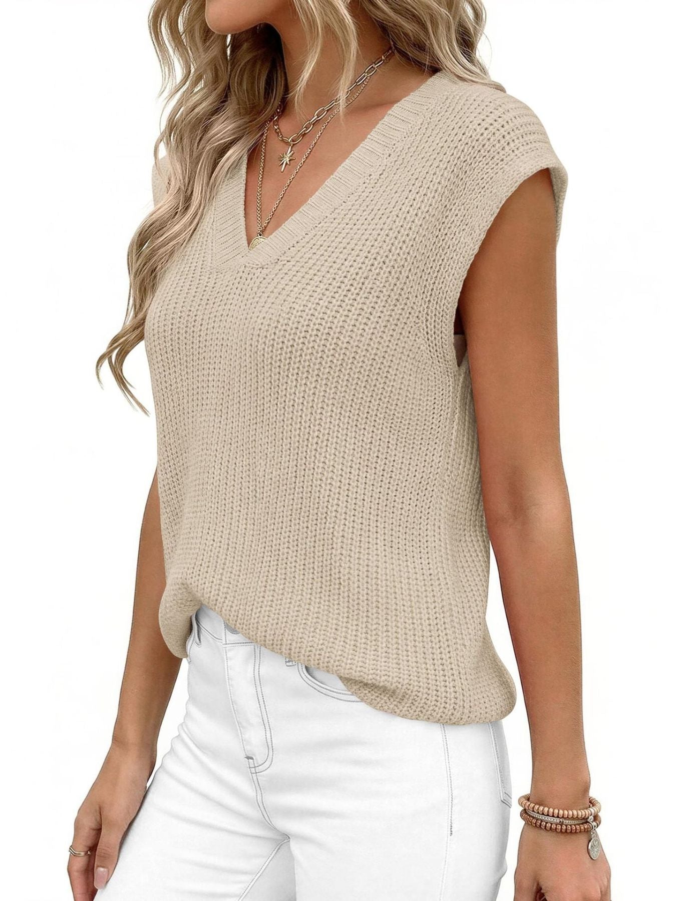 V-Neck Sweater Vest by Trendsi in beige knit fabric; shown with white jeans and layered necklaces