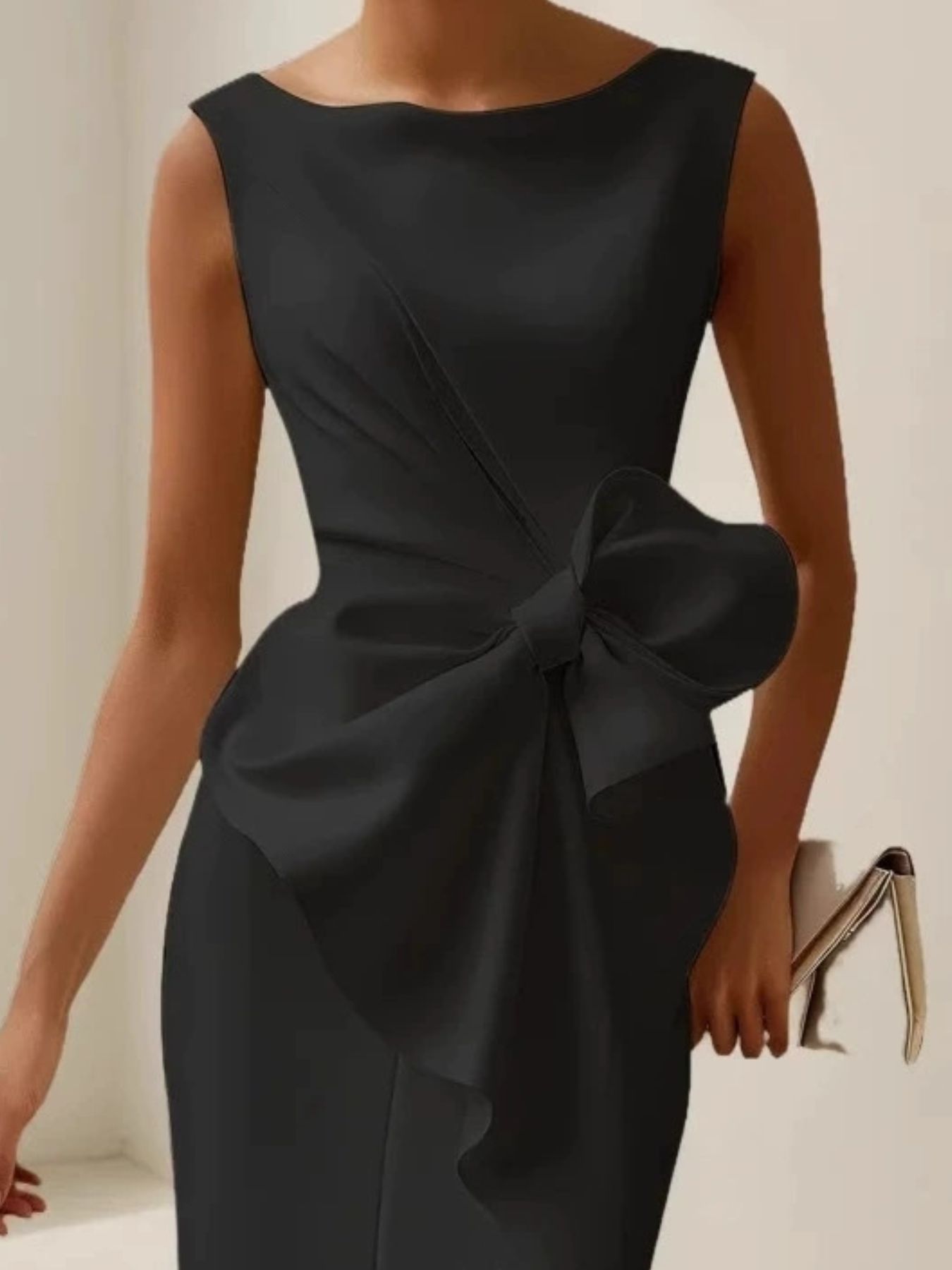 Full Size Bowknot Front Sleeveless Dress Plus Size, black with a large front bow.