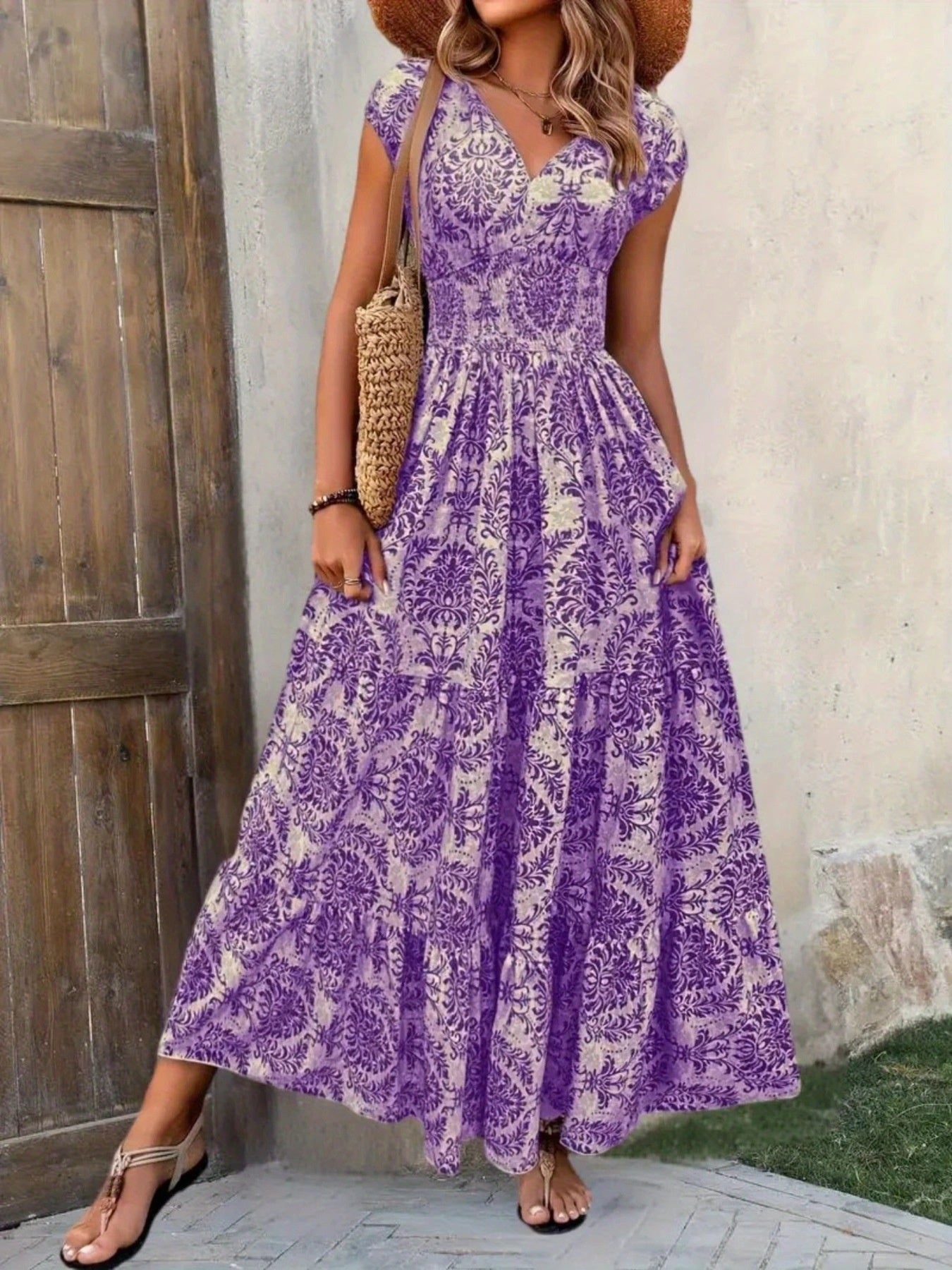 Printed cap-sleeve maxi dress in purple and ivory damask pattern; tiered, smocked waist.