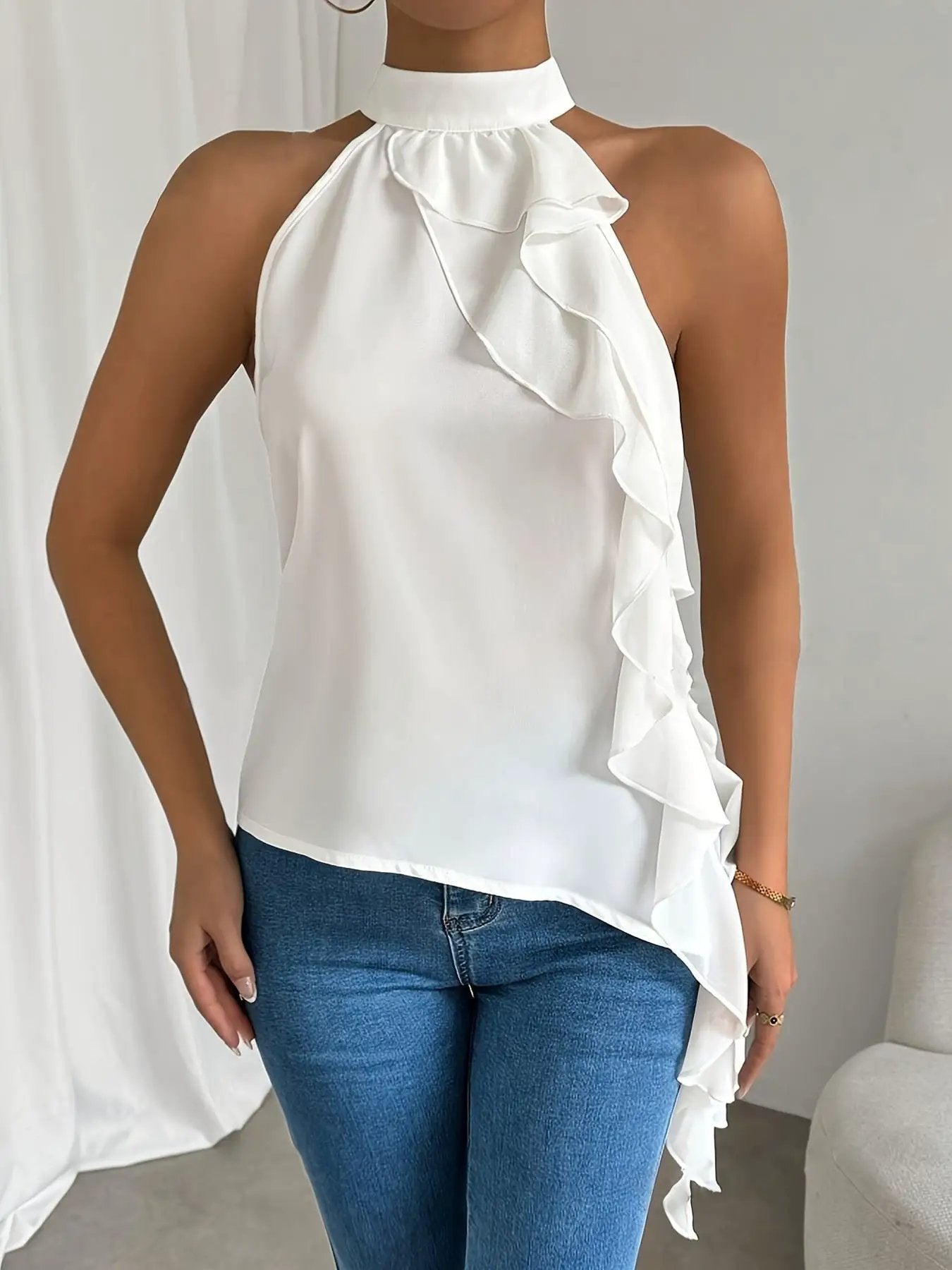 Ruffle halter neck sleeveless blouse in white with cascading front ruffle detail