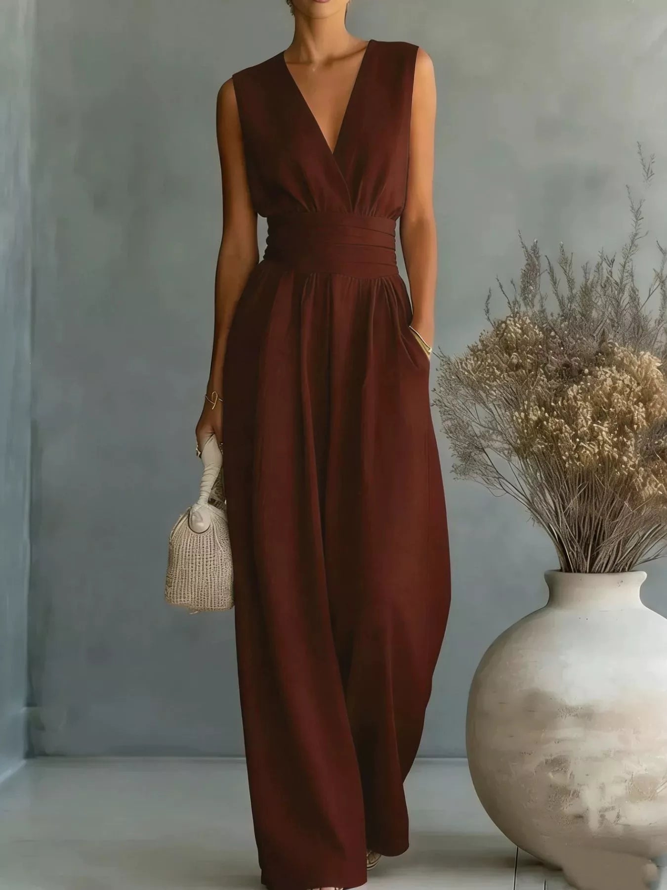 Trendsi full-size sleeveless wide-leg jumpsuit, plus size, in rust-brown with a wrapped waist belt