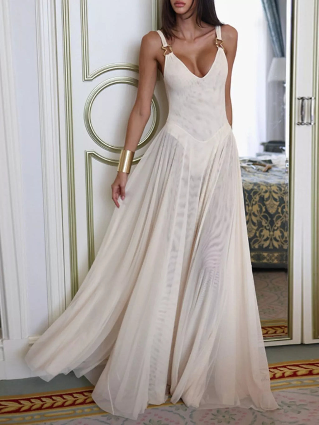 Belle Bijouix sleeveless sheer ivory maxi dress with gold hardware straps and pleated mesh skirt