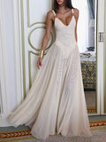 Belle Bijouix sleeveless sheer ivory maxi dress with gold hardware straps and pleated mesh skirt