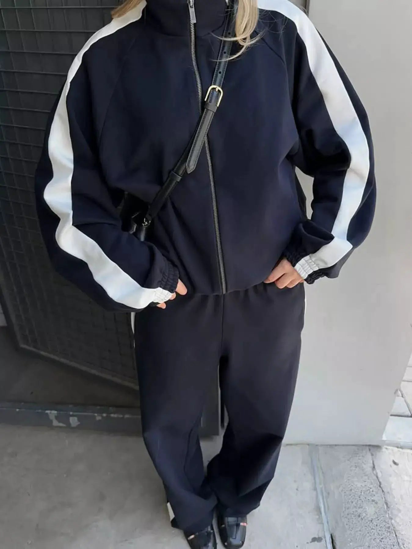 Two-Piece Zip Up Long Sleeve Outerwear And Pants Set in navy blue with white stripe sleeves