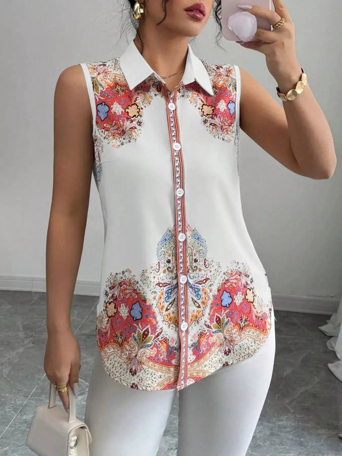 Button Up Sleeveless Shirt with white collar and vibrant multicolor paisley print.