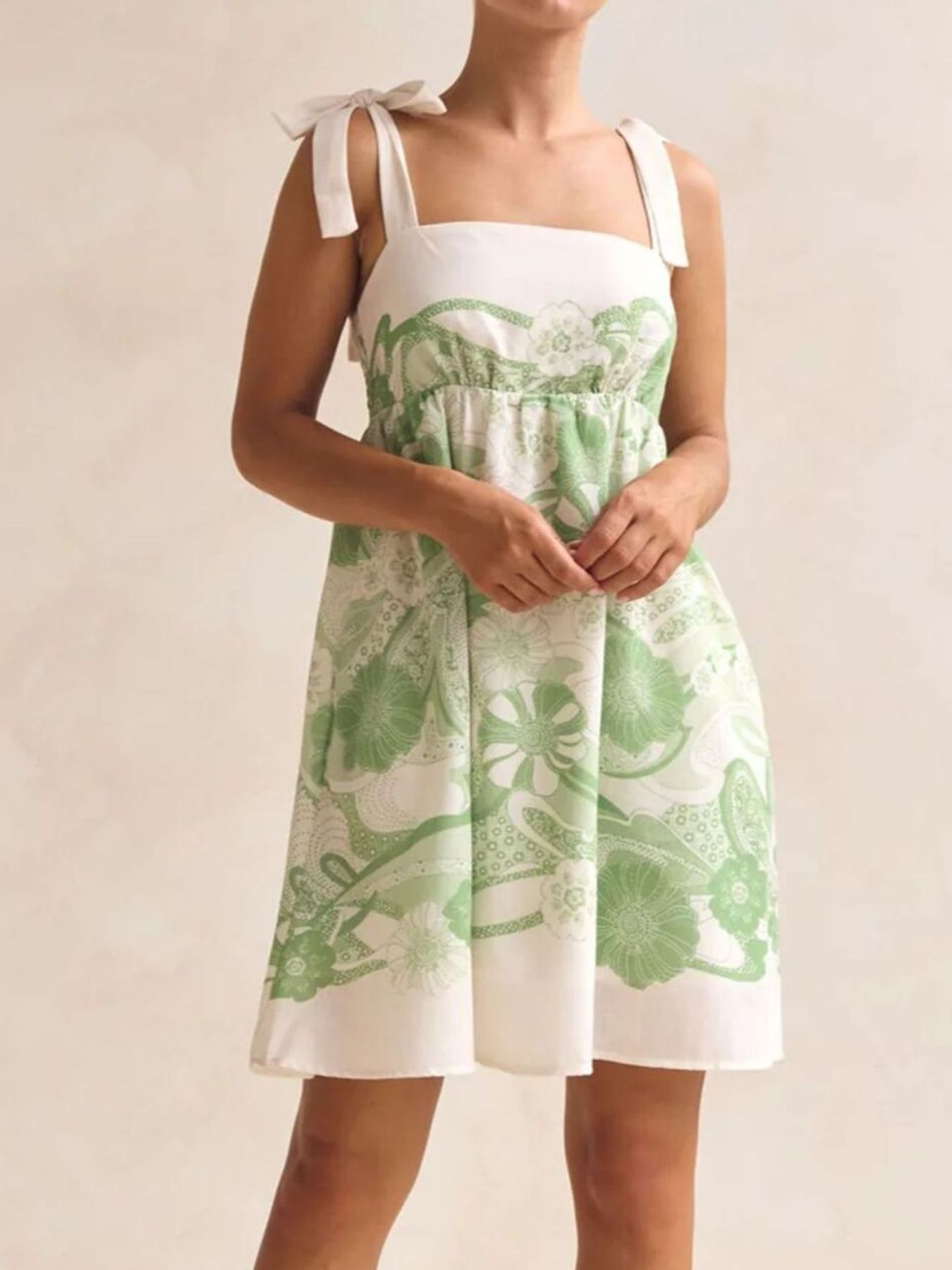 Printed Tie-Shoulder Mini Dress by Belle Bijouix in green and white floral print