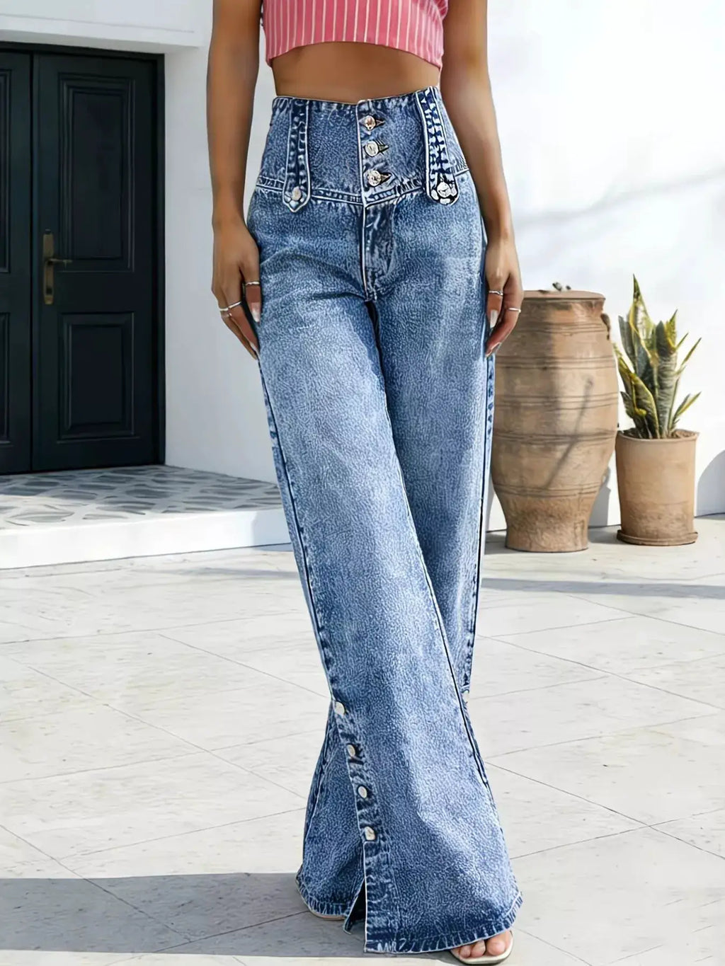 High-waisted wide-leg jeans with button fly in blue acid-wash denim