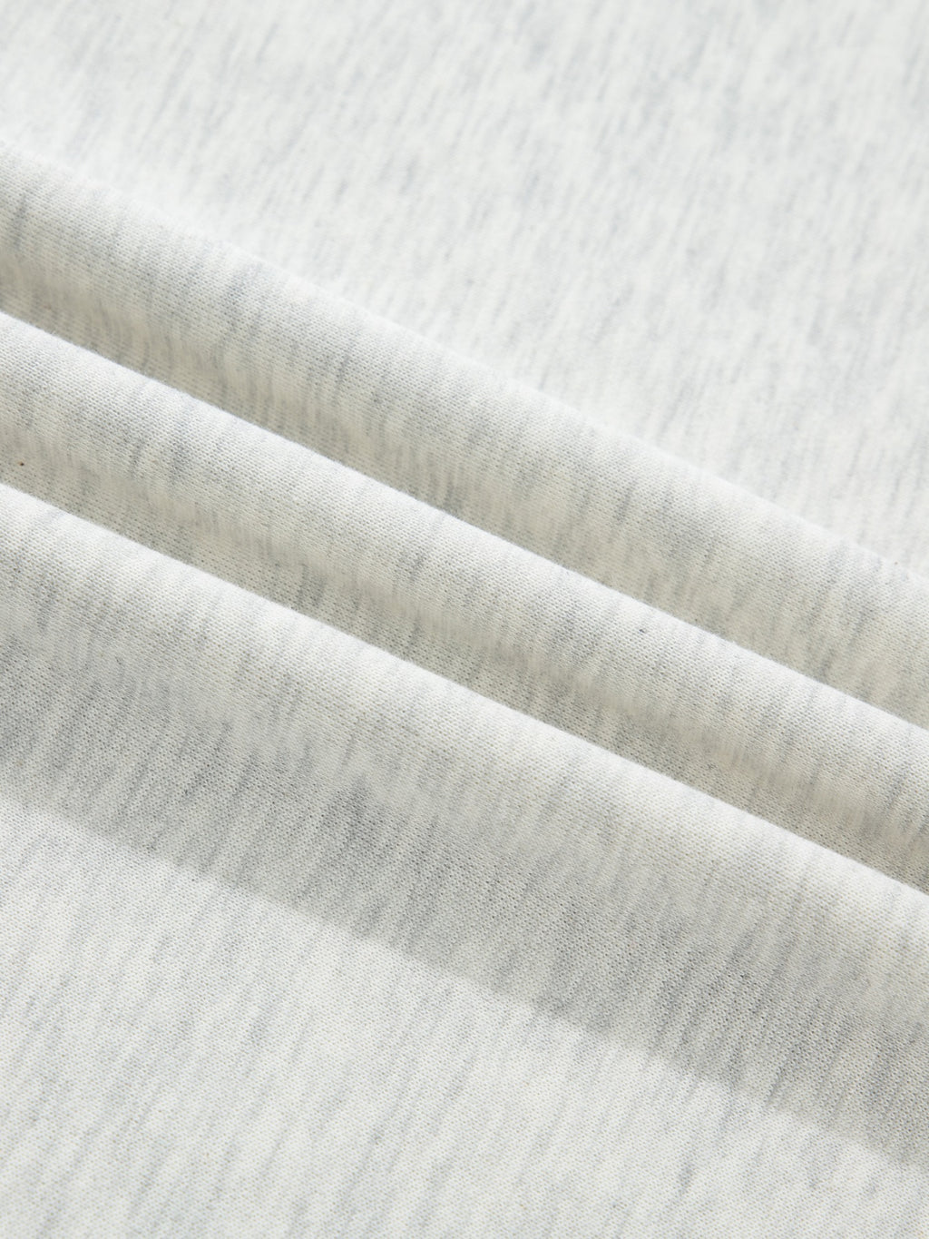 Contrast Trim Button Detail Top fabric close-up in heather gray knit.