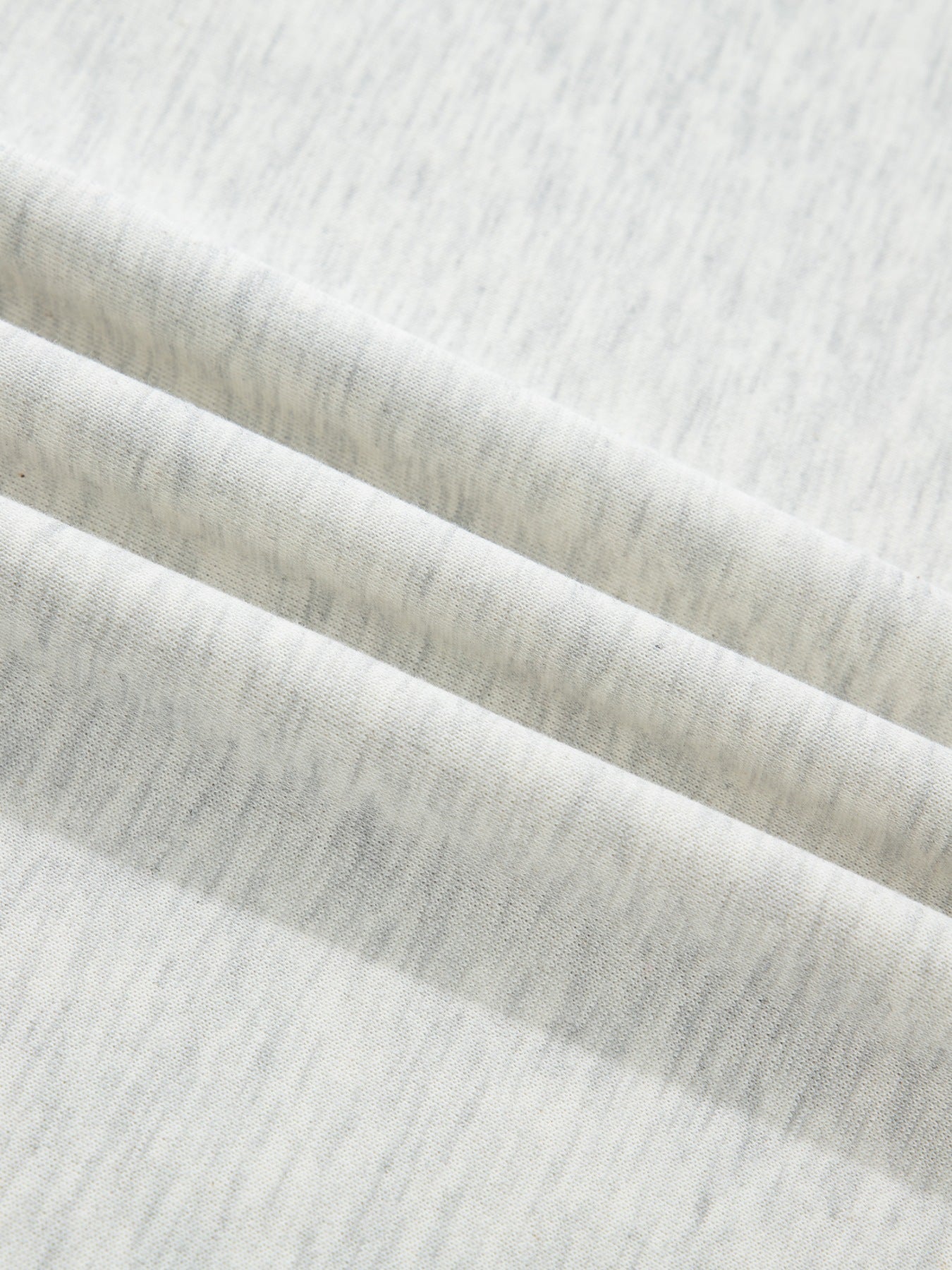 Contrast Trim Button Detail Top fabric close-up in heather gray knit.