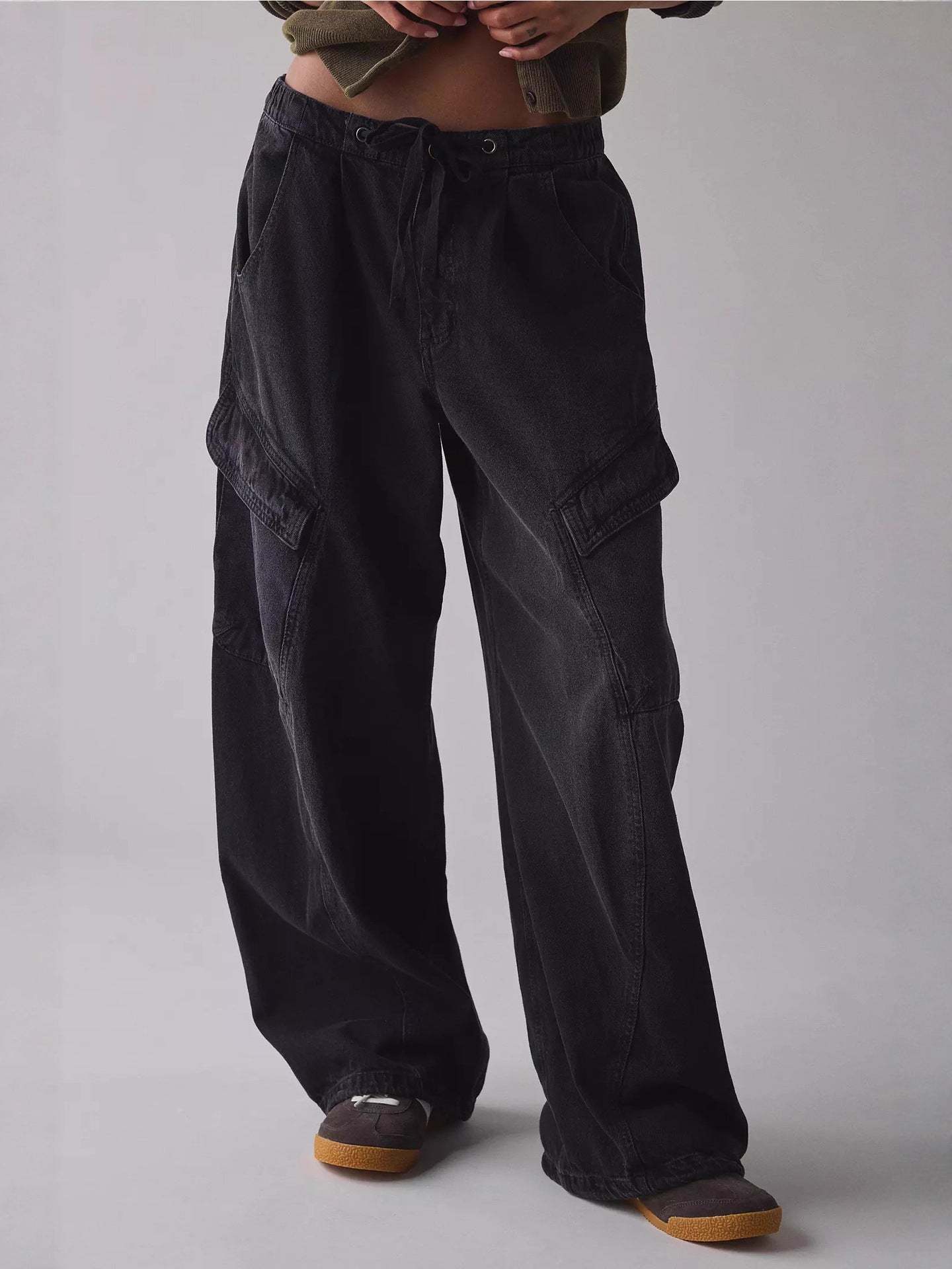 Drawstring Waist Cargo Jeans, black with cargo pockets and relaxed fit; Trendsi.