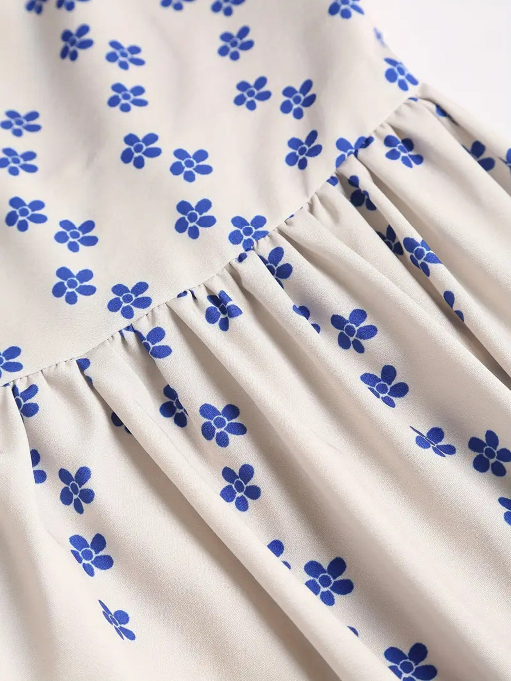 Sardine Print Midi Dress, white fabric with blue small print and pleated ruffle hem